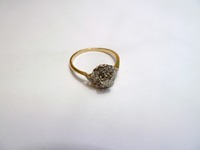Yellow and white god cluster ring set with diamonds