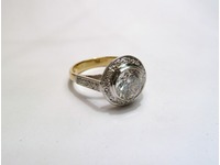 18ct yellow and white gold single stone with diamond shoulders and surround