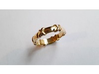 Yellow gold fancy wedding ring made using the gold from two signet rings that had lost their stones