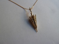 Yellow gold umbrella pendant set with different colour sapphires - and the umbrella handle turns!