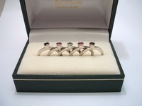 Sterling silver stone set stacking rings each hand engraved with childrens' initials