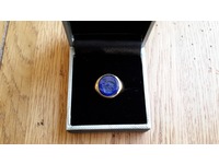 Yellow gold signet ring set with seal engraved lapis lazuli