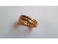 Yellow gold ring with two twisted bands.