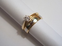 18ct yellow gold and platinum wedding ring with 18ct yellow gold solitaire diamond ring