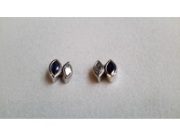 White gold stud earrings set with marquise diamonds and sapphires