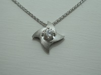 Platinum pendant set with diamond on platinum chain