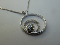 White gold and diamond pendant