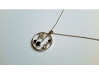 18ct white gold sapphire and diamond pendant