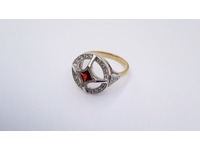 18ct yellow and white gold garnet and diamond dress ring