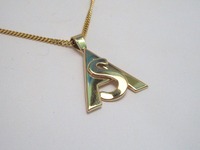 Yellow gold initial pendant