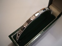 9ct white gold bangle set with diamonds