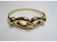 9cy yellow gold ladies bangle.